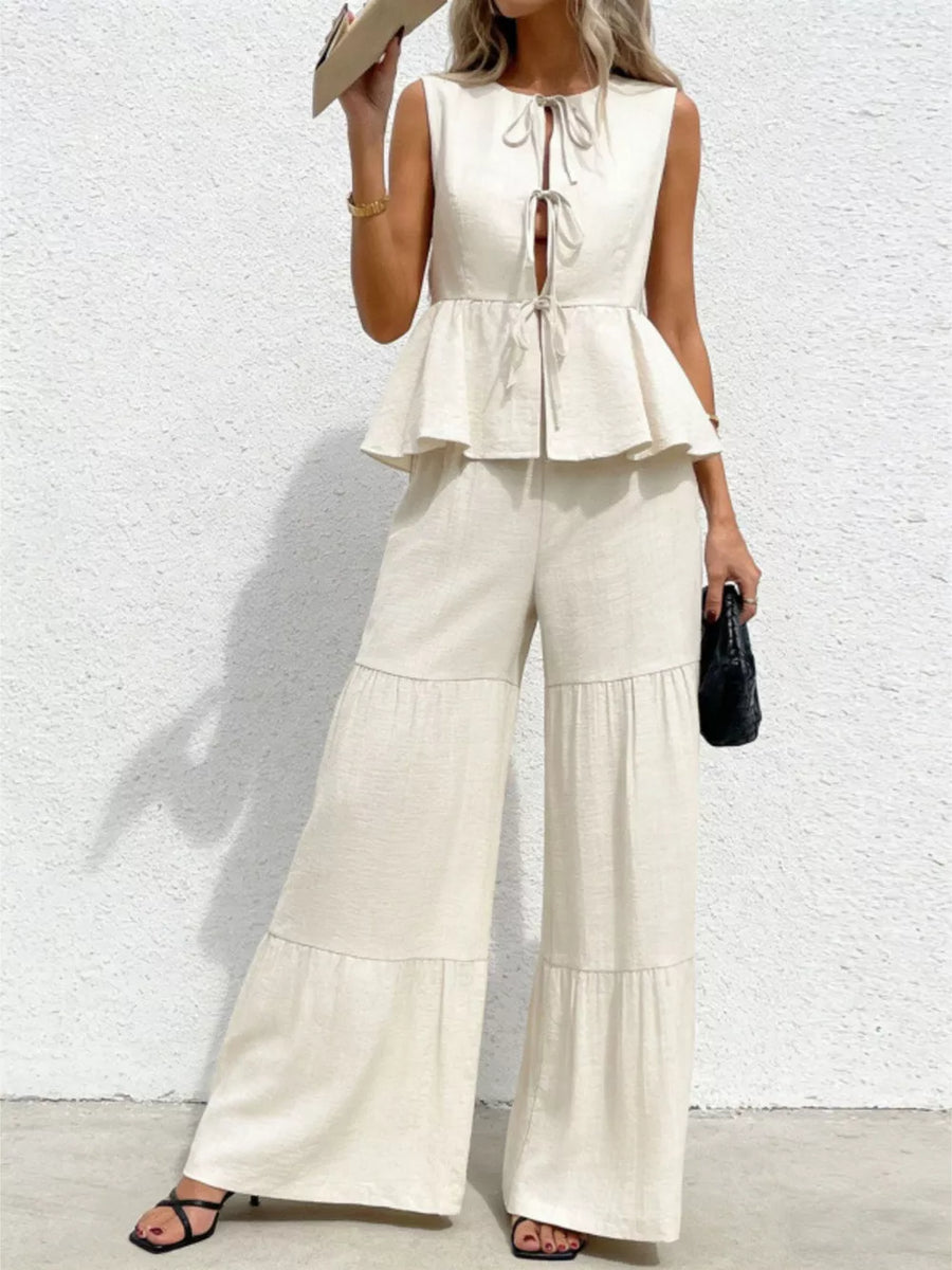 Beige ruffled tie-front sleeveless peplum top with tiered wide-leg pants set