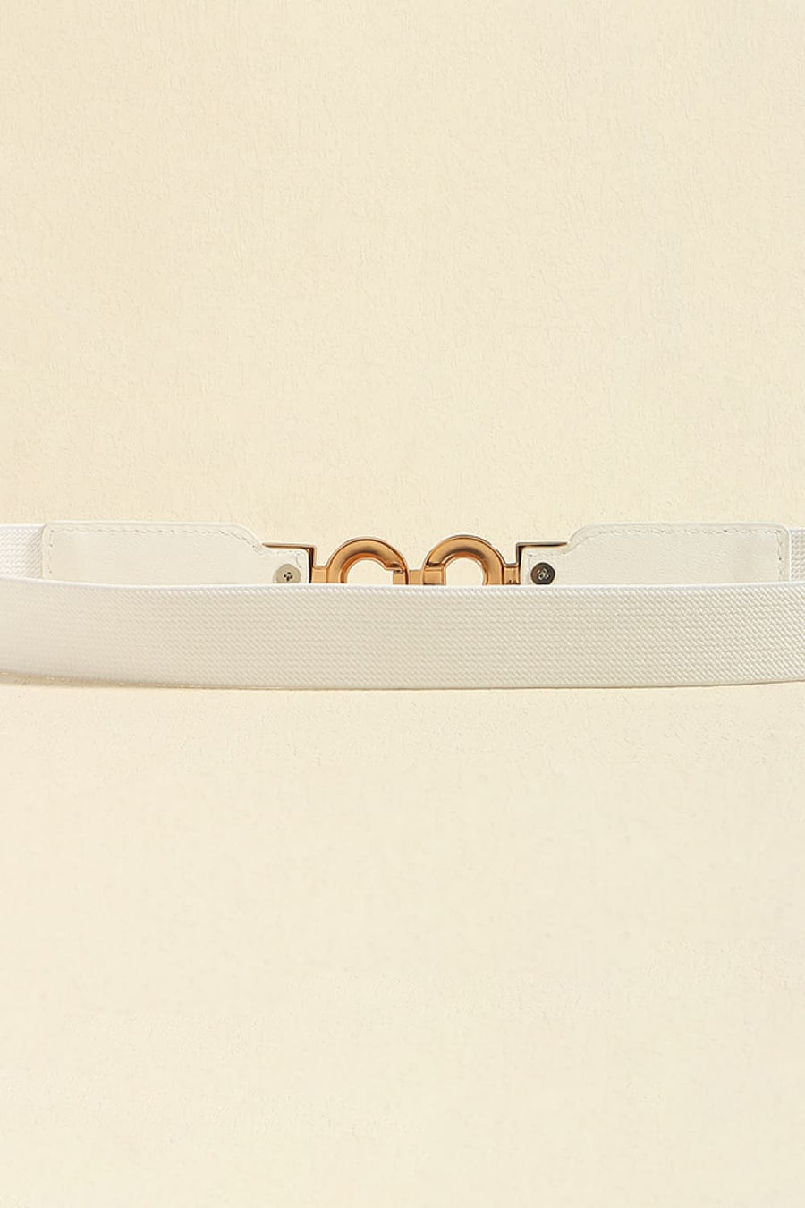 White elastic belt with gold interlocking buckle detail