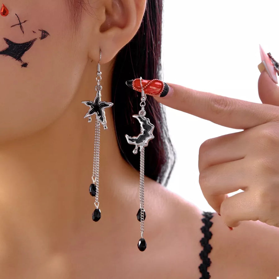 silver earrings with moon motif and not applicable