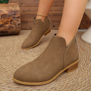 Black ankle boots with ankle-length and back-zip