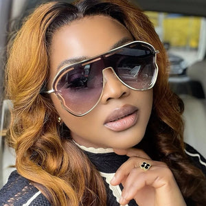 Statement aviator sunglasses with gradient lenses and gold metal frames