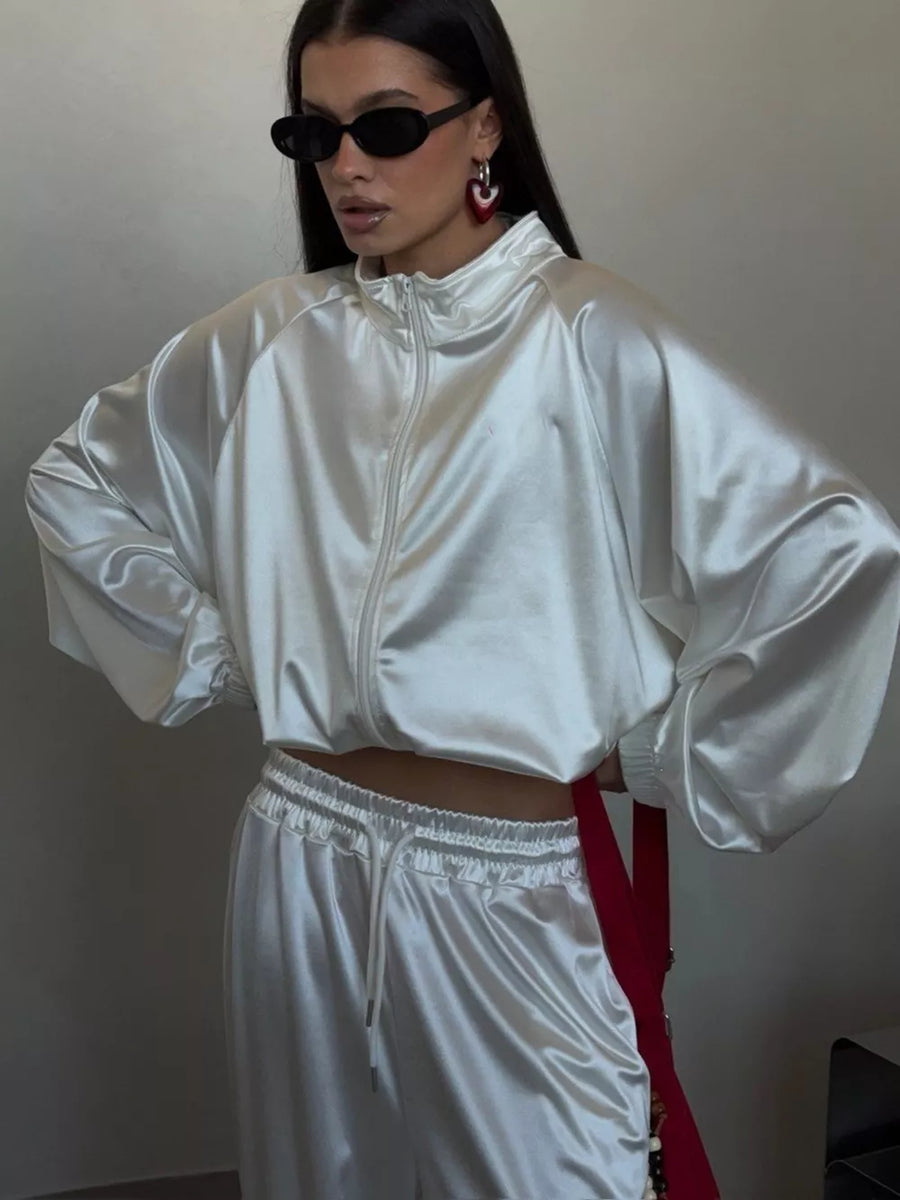 Red track jacket with zipper and raglan sleeve