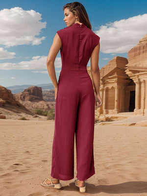 Burgundy draped neckline wide-leg jumpsuit with cap sleeves and a high neck.