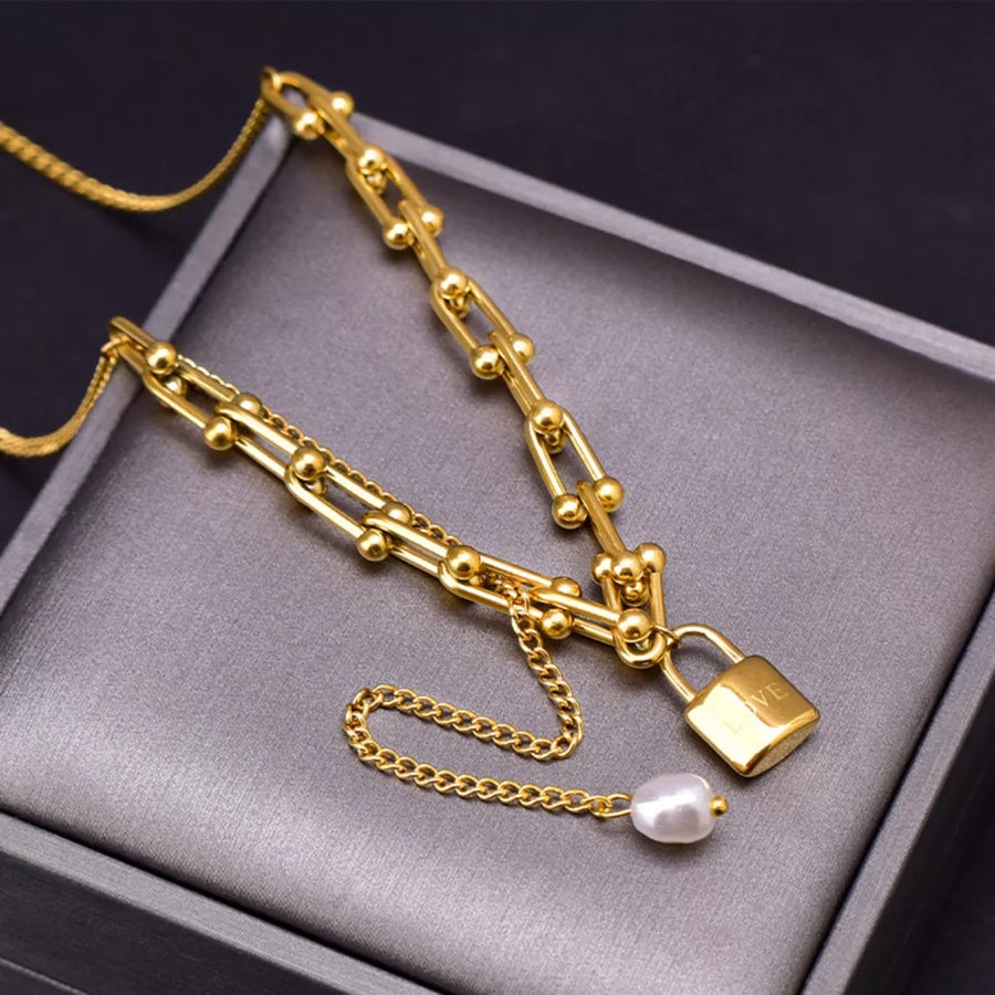 gold necklace with collar and clasp