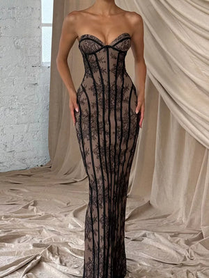 Black lace sweetheart neckline maxi dress with corset detailing and sheer overlay.