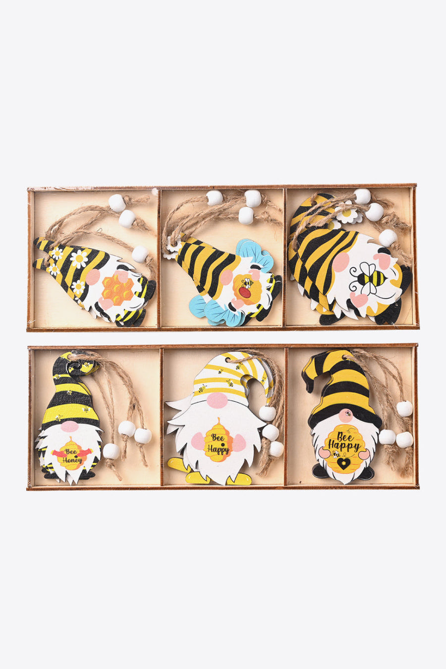 Bee gnome ornaments in yellow and black with bee designs and sayings like Bee Happy.