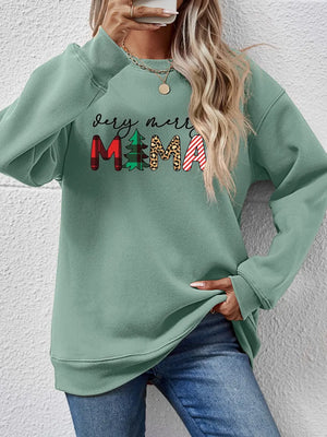 Sage green crewneck sweater with abstract graphic print and long sleeves