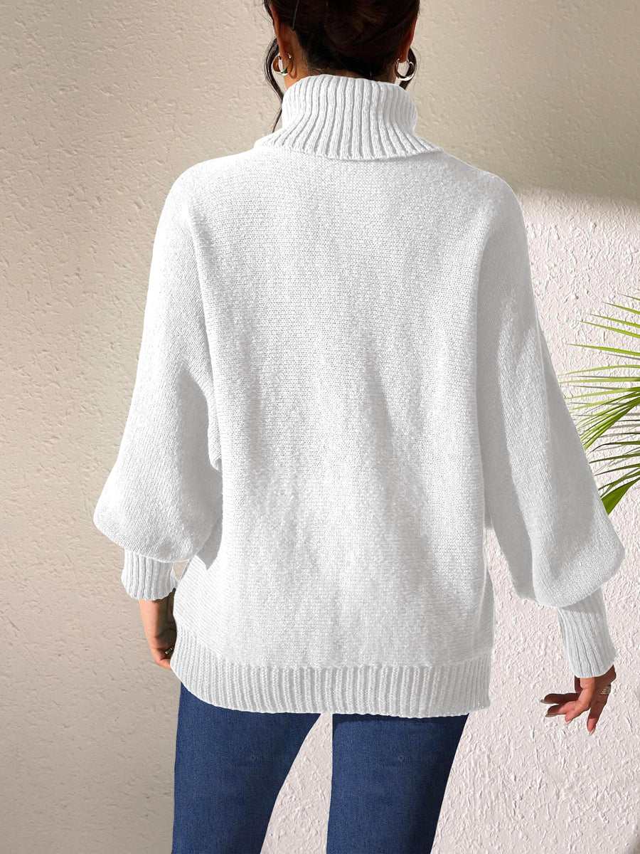 White balloon sleeve turtleneck sweater with ribbed cuffs and hem