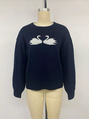 pullover sweater in navy blue with dropped shoulder and hip-length