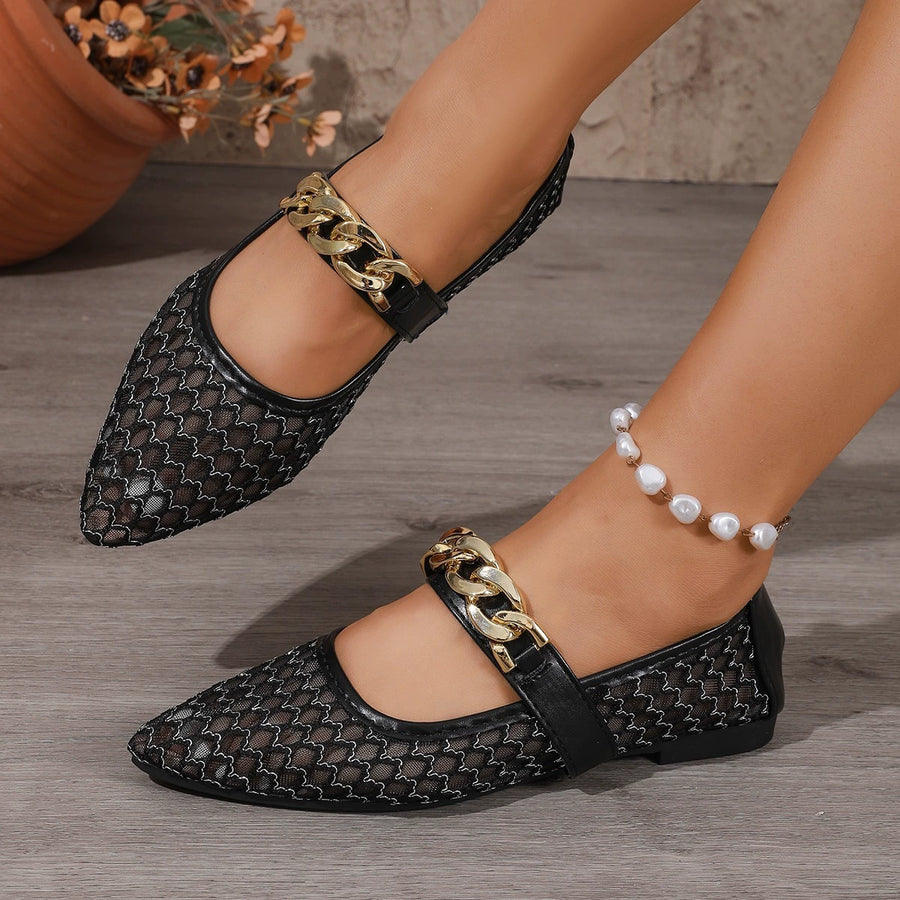 flats in black featuring point toe and flat fit