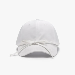 White baseball cap with a tied back bow detail