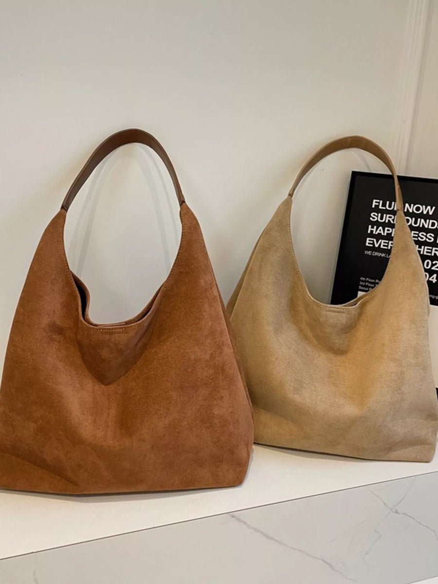 Elegant suede hobo tote mini handbag in brown and khaki with leather straps.