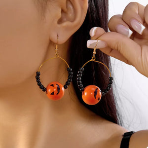 earrings featuring spiderweb in black with 18K Gold-Plated, Iron, Foam balls Care instructions: 1 texture