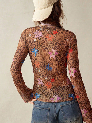 black blouse featuring mesh and leopard-print floral
