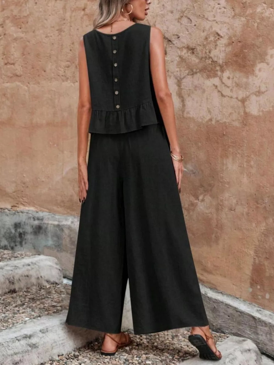 Black ruffled peplum top with button back and wide-leg pants set