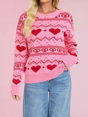 light pink pullover sweater with fair isle with hearts and bows and crew neck