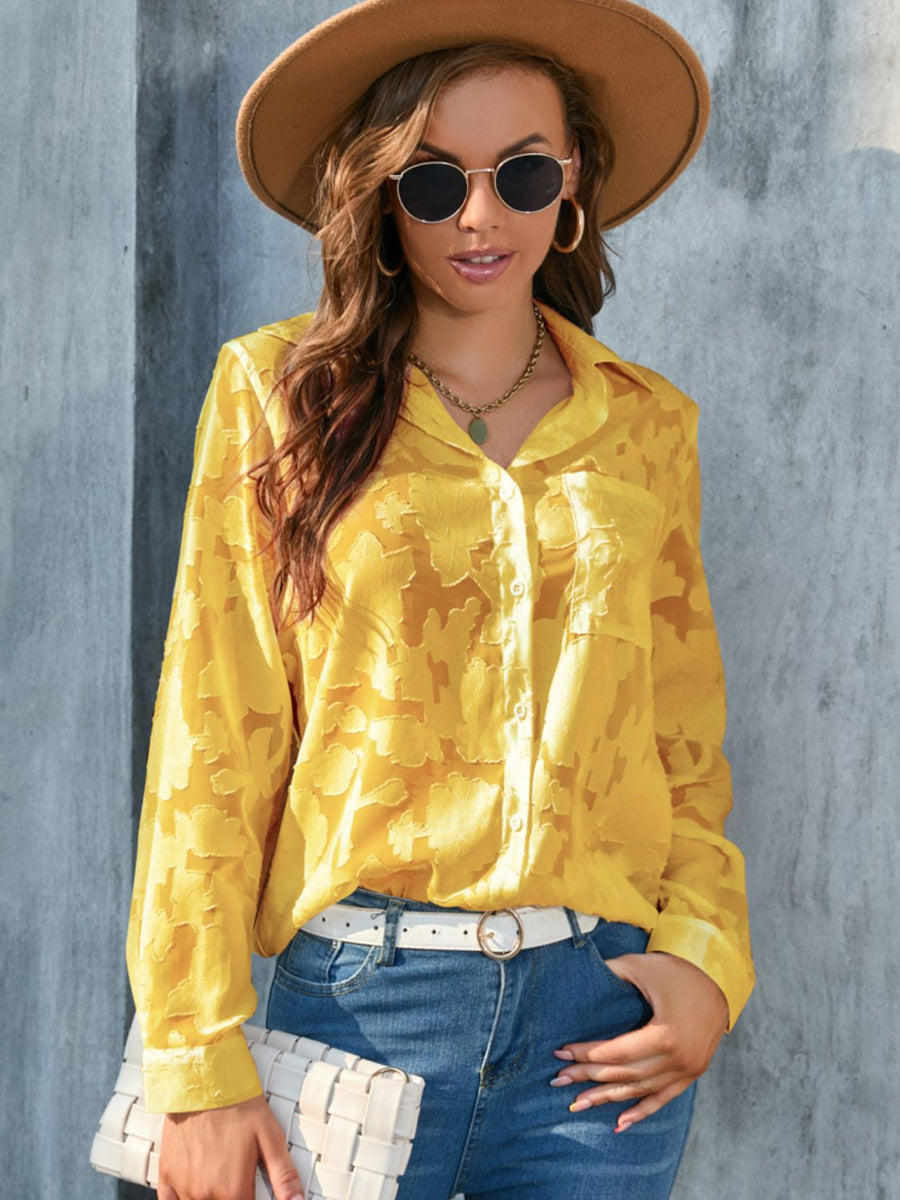 Yellow sheer button-down blouse with floral embroidery, long sleeves, and a collared neckline.