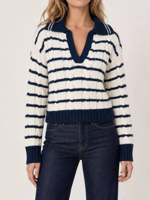 100% polyester Care instructions: Machine wash cold pullover sweater in Blue with relaxed silhouette