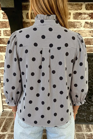 blouse in brown with polka dot and buttoned
