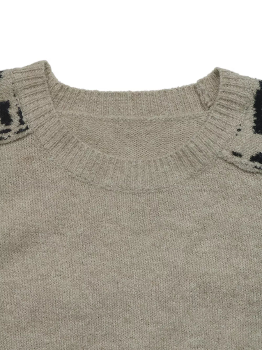beige pullover sweater with seam detail and long sleeve