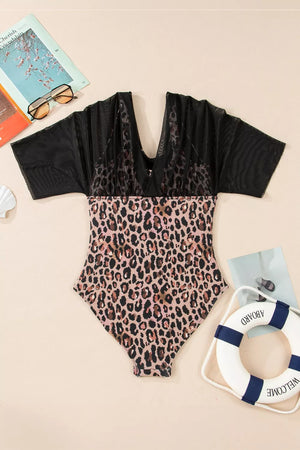 one-piece swimsuit in Navy with mesh patchwork and thigh-length
