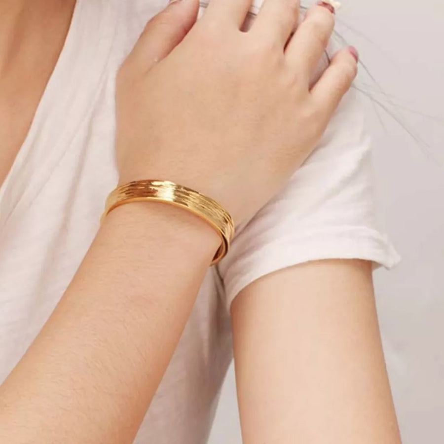 bracelet featuring textured in Gold with 18K Gold-Plated, Copper Care instructions: Avoid wearing during exercise, as swe
