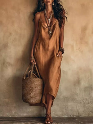 midi dress in camel featuring pocketed and relaxed fit