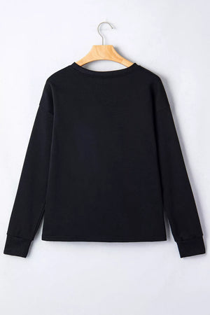 sweatshirt in orange with checkered and rhinestone embellishment