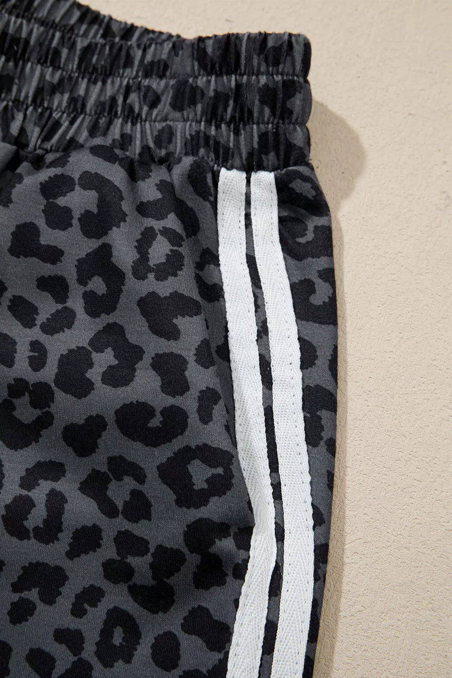 lounge set in black with leopard-print and pocketed