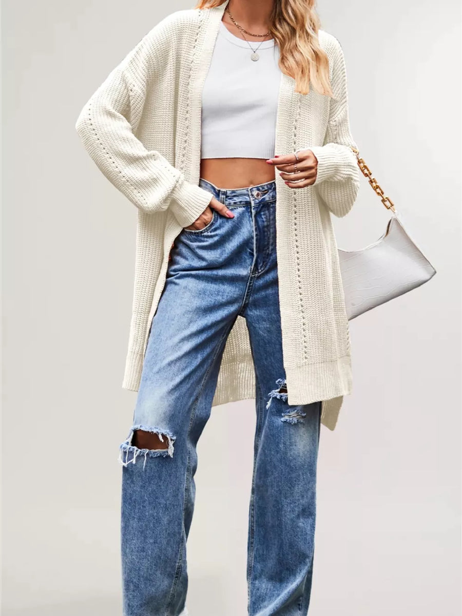 cardigan in cream featuring pocketed and relaxed fit