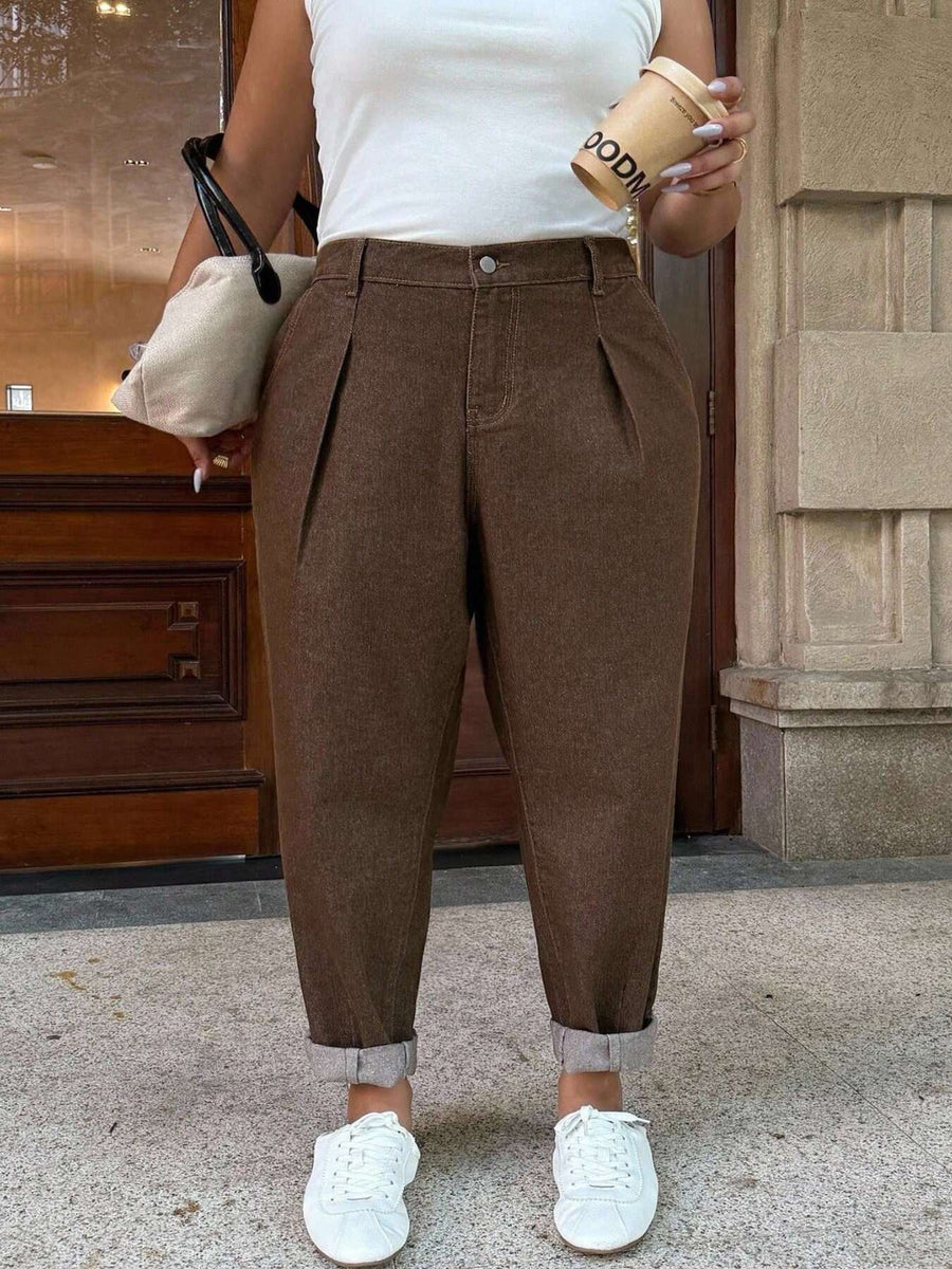 95%cotton,5%spandex Care instructions: Machine wash cold jeans in Brown with loose silhouette