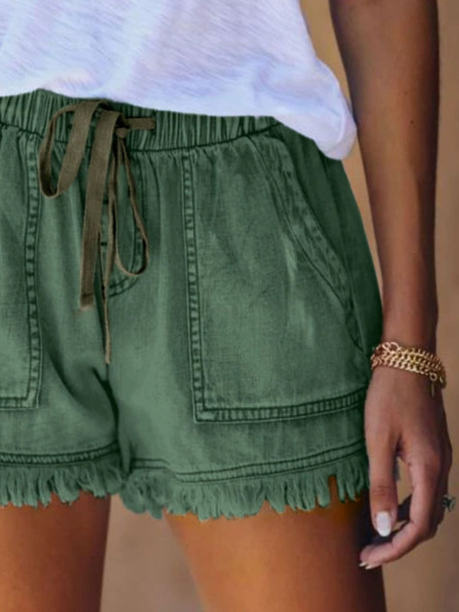 denim shorts in Pink with raw hem and mini