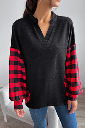 Black henley top with contrast red buffalo plaid balloon sleeves and V-neck