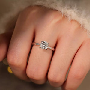 ring in silver featuring solitaire setting and classic fit