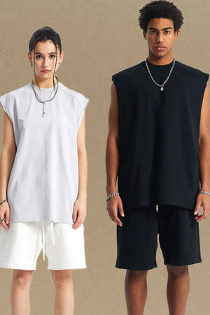 Boxy shoulder cut tank top in light gray and black with a relaxed fit.