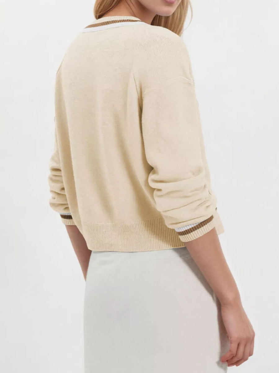 50% Viscose 28% Polyester 22% Polyamide Care instructions: Machine wash cold cardigan in white with regular silhouette