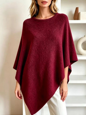 100% polyester Care instructions: Machine wash cold poncho in Gray with oversized silhouette