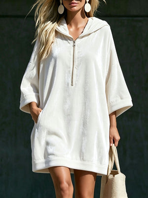 hoodie dress in ivory featuring pocketed and relaxed fit