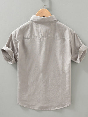 Royal Blue button-down shirt with hip-length and button-front