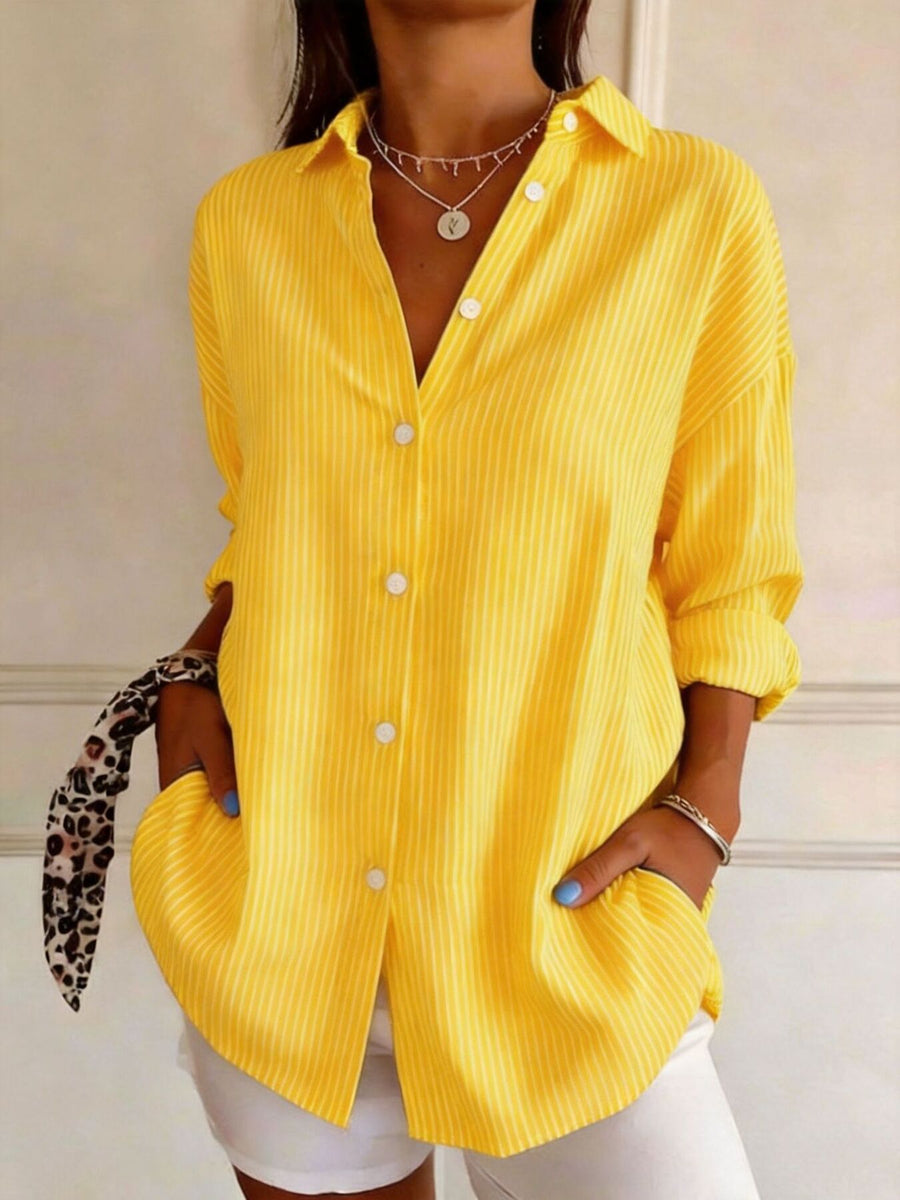 Yellow button-down shirt with hip-length and button-front