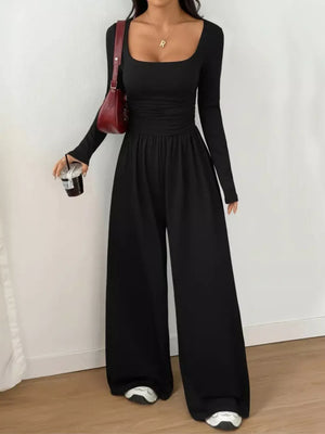 100% polyester Care instructions: Machine wash cold jumpsuit in Dark Gray with wide-leg silhouette