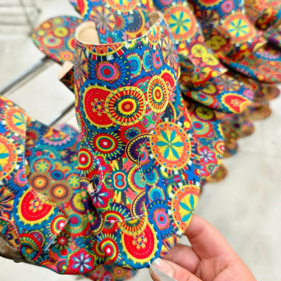 Looped in Flats 3 Sandals with a vibrant, colorful mandala pattern.