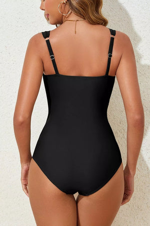 black one-piece swimsuit with removable padding and sleeveless