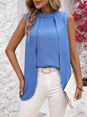 Blue Theme mock neck sleeveless tank top with textured fabric and draped overlay.