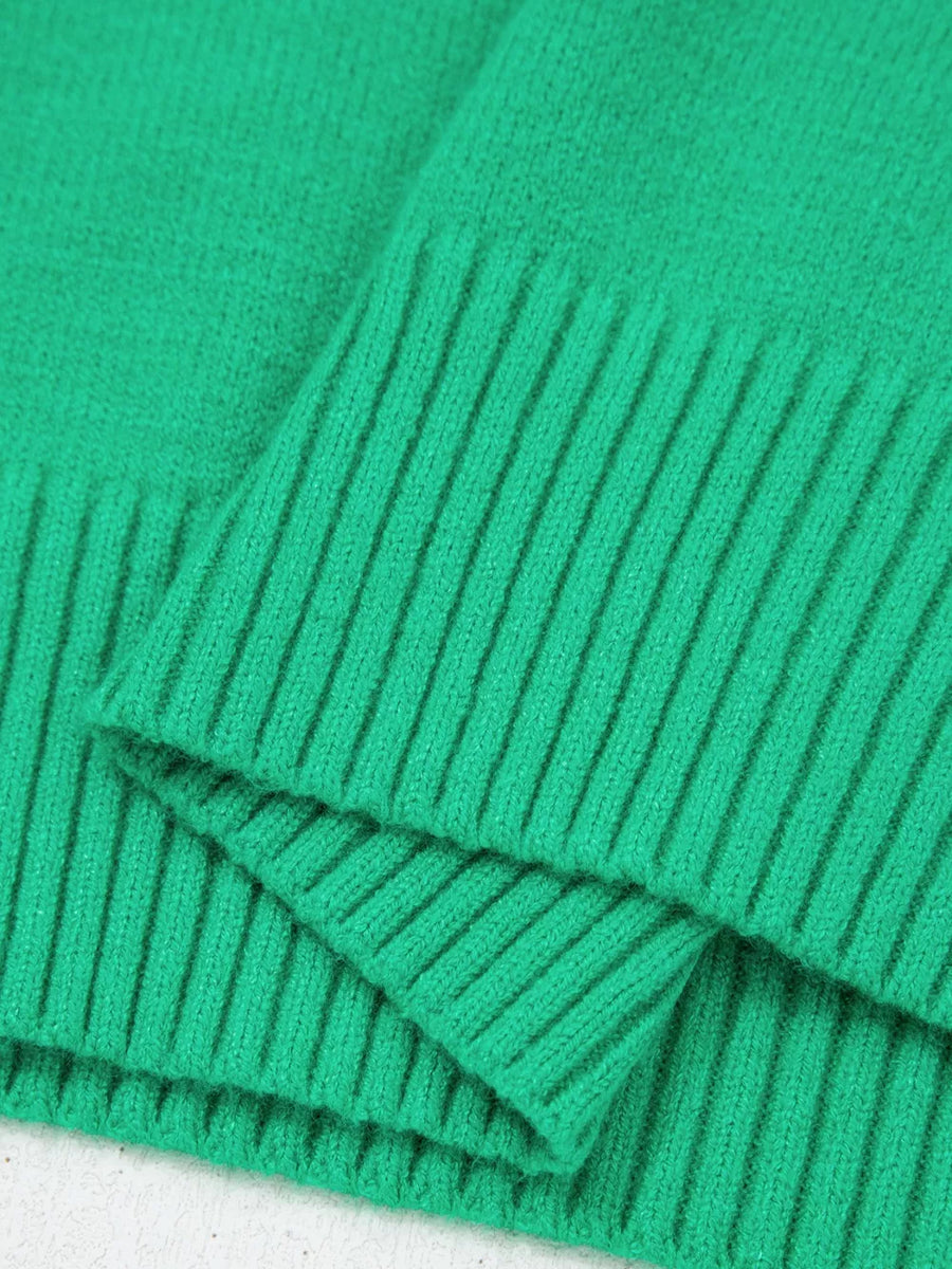Green ribbed knit top with ruffled detail and round neck