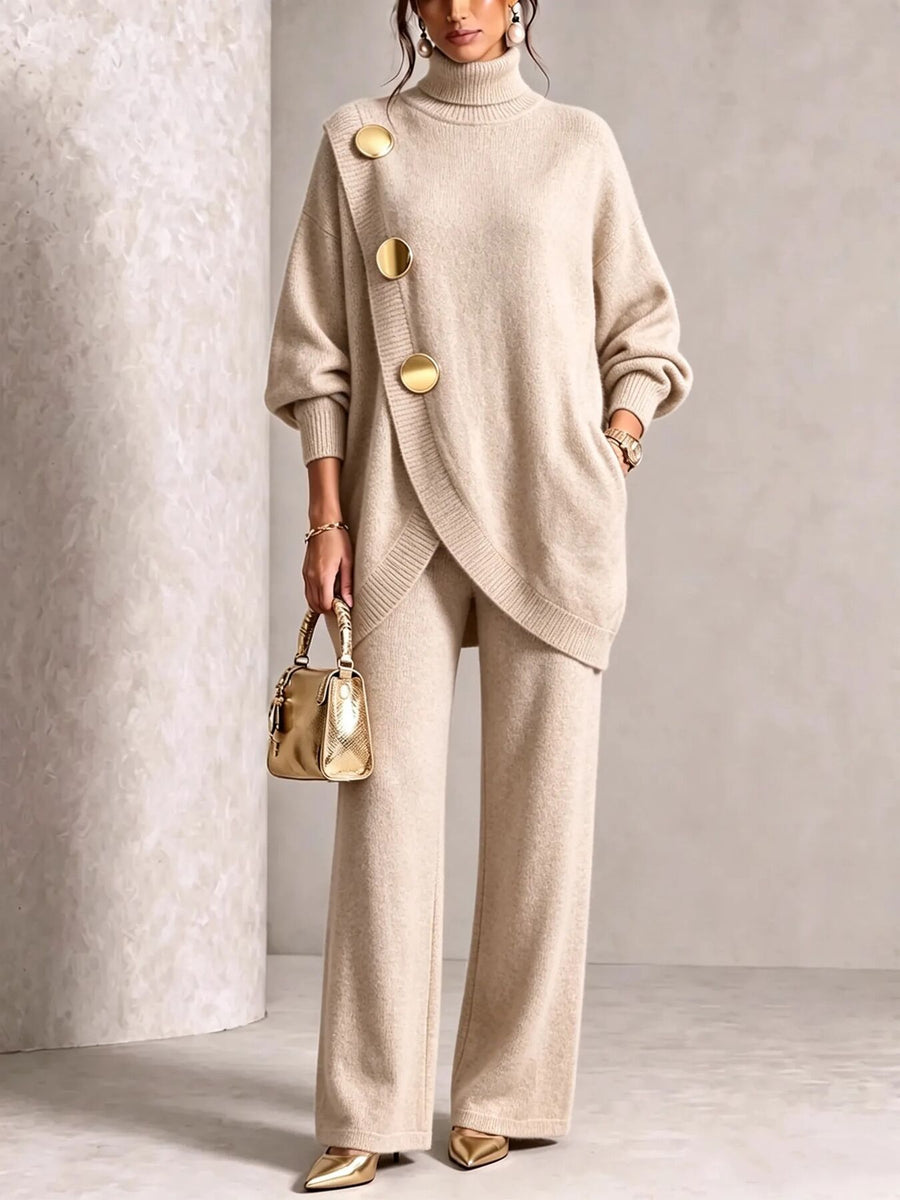 Black sweater and pants set with gold button accents and long sleeve