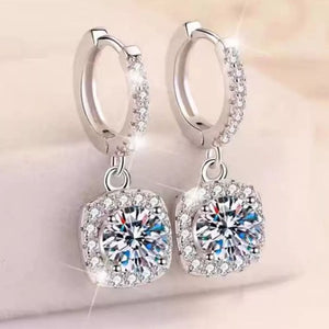 925 sterling silver,Moissanite Carat weight: 1ct Care instructions: Avoid wearin earrings in Silver with drop silhouette