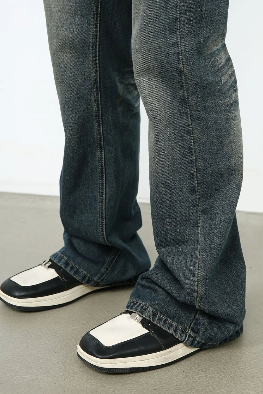 Faded flare denim jeans in dark vintage wash with a bootcut leg