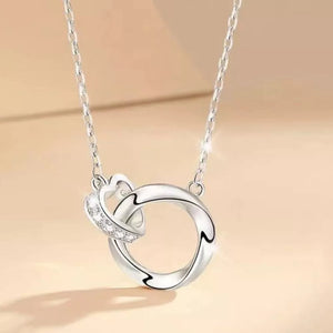 necklace featuring interlocking circles in silver with 925 sterling silver Care instructions: Avoid wearing during exercise