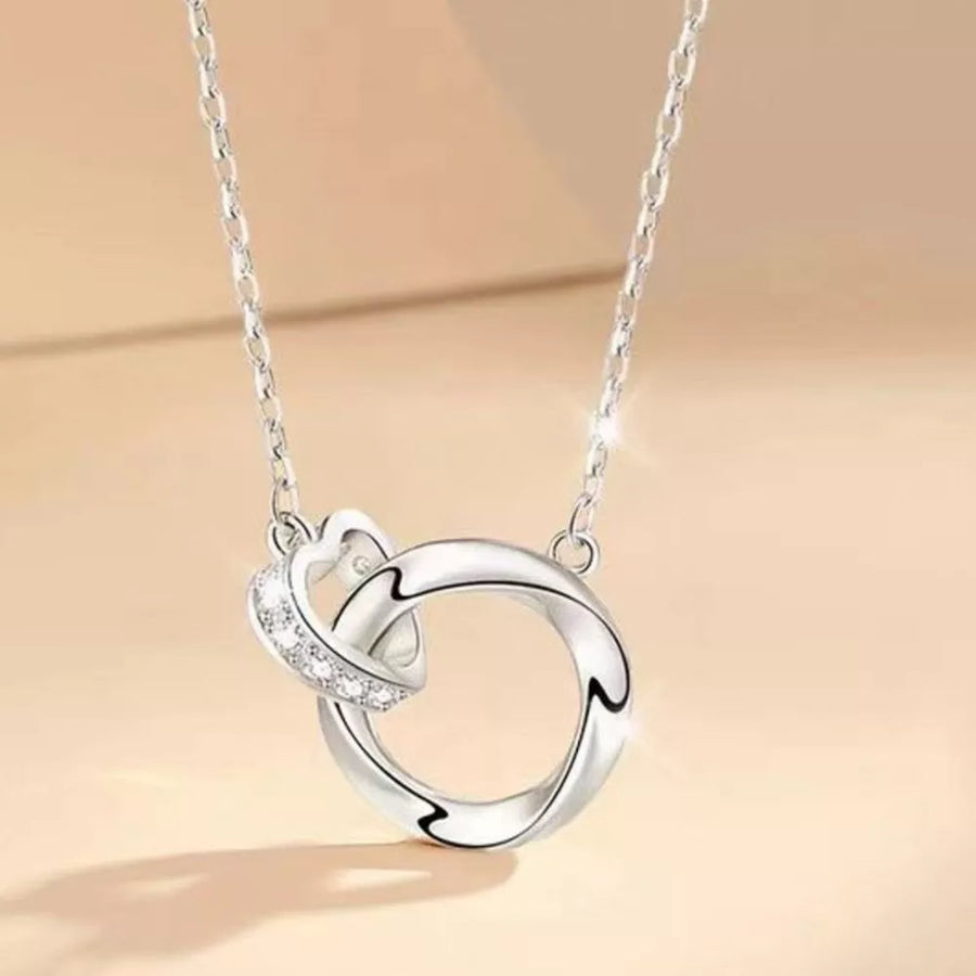 necklace featuring interlocking circles in silver with 925 sterling silver Care instructions: Avoid wearing during exercise